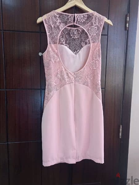 A dress with a very good quality and only used one time . Size 42 2