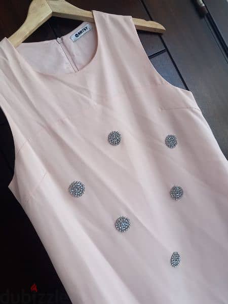 A pink dress with very good condition only used one time Size 42 1