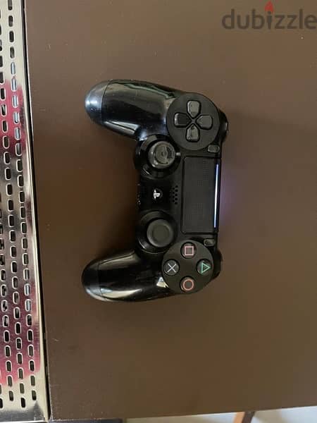 PS4 Slim with 3 controllers and C. O. D cd 4