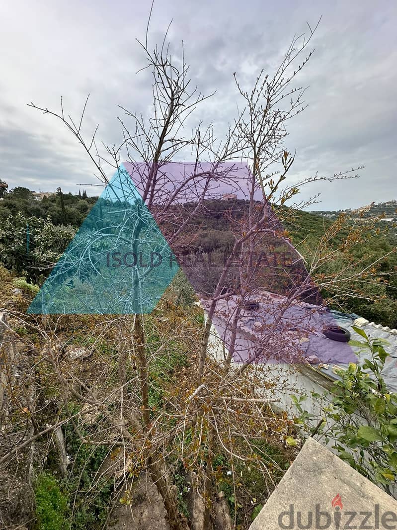 A 5860 m2 land with 85 m2 single house for sale in Bejdarfel/Batroun 5
