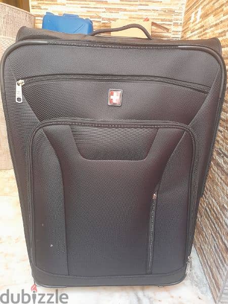 Swiss and millinium large suitcases 1