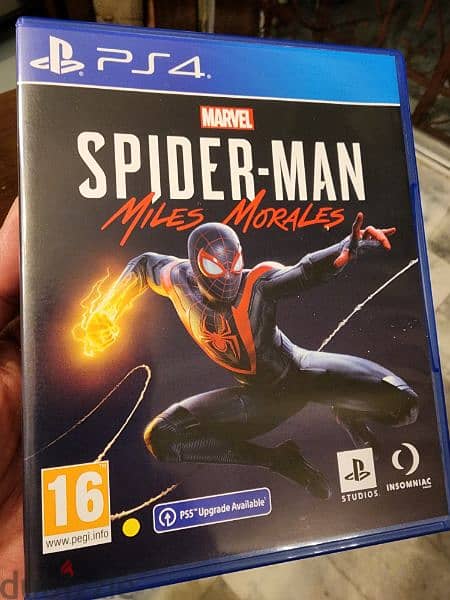 video games FIFA 22, SpiderMan Miles Morales, Joystick original 5