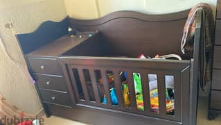 baby bed for sale new never used with portable cageتخت مع ٣ جوارير ع