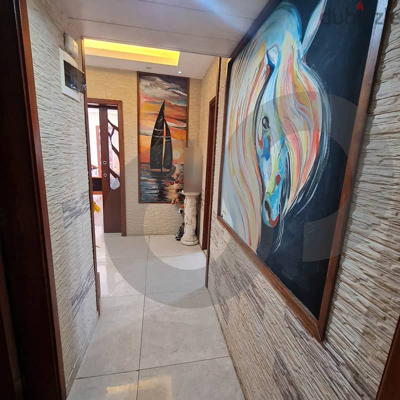 Fully decorated with a partial sea view in Safra/الصفرا REF#SA104369 4