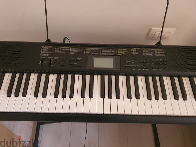 Casio CTK1100 piano keyboard with stand 1