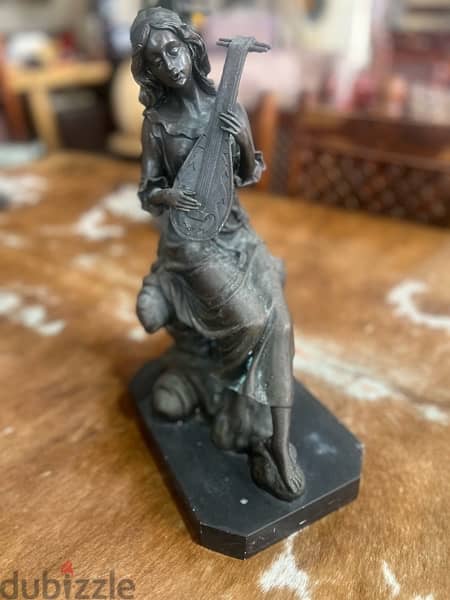 bronze piece girl with musical instrument 2