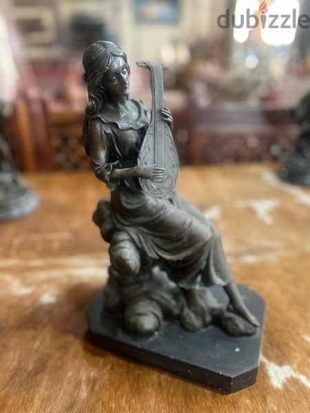 bronze piece girl with musical instrument 3