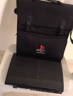 PS3 in good condition with its offical playstation bag 0