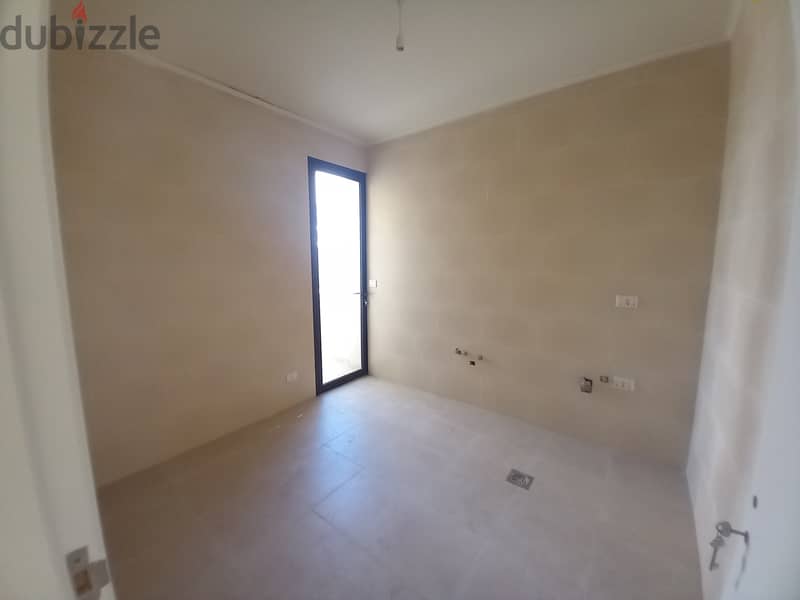 Apartment with Roof for Sale in Zouk Mosbeh 11