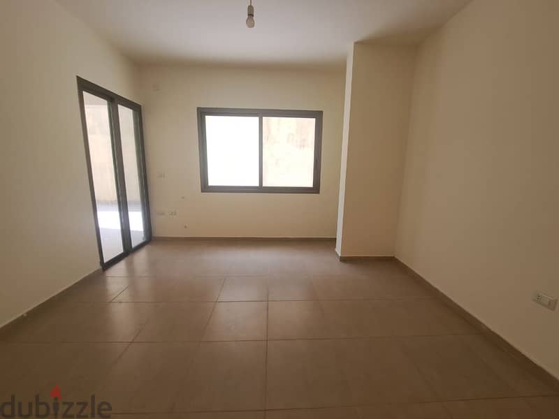 Charming Apartment with Terrace for Sale in Louaizeh 2