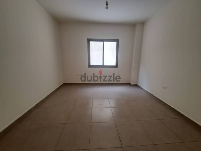 Charming Apartment with Terrace for Sale in Louaizeh 3