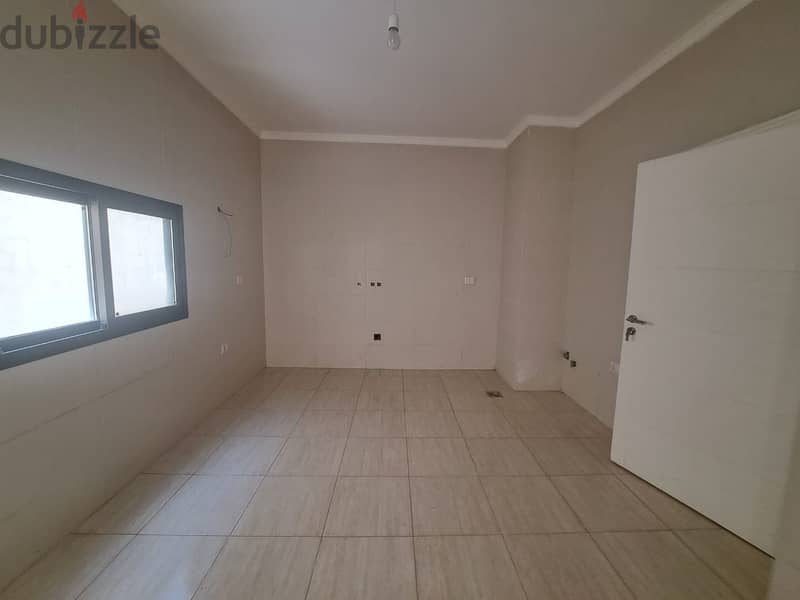 Charming Apartment with Terrace for Sale in Louaizeh 4