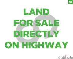 1410 sqm land for sale in fatri  Directly on highway/فتري REF#RS104596