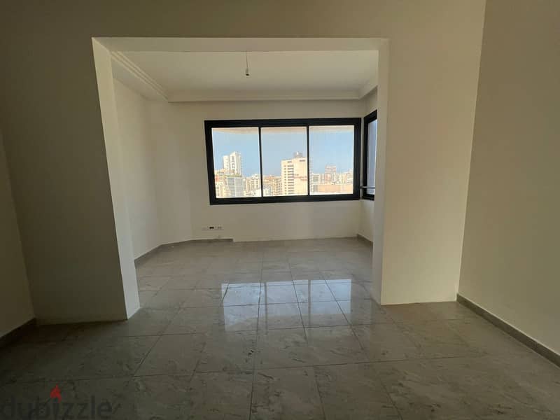 L12422- Office for Rent in a Commercial Center in Achrafieh, Adlieh 1