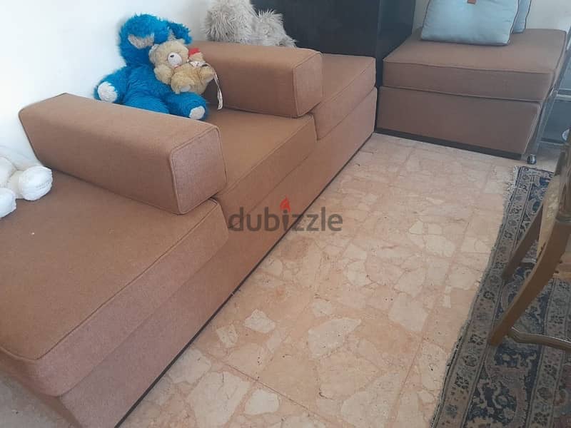 black leather - 2 seater couch + light brown couch and pouf 1