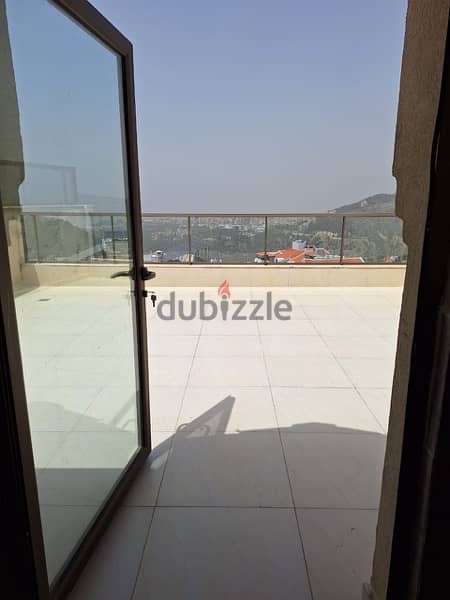 A rooftop apartment with open views for rent in Mazraat yachouh. 1