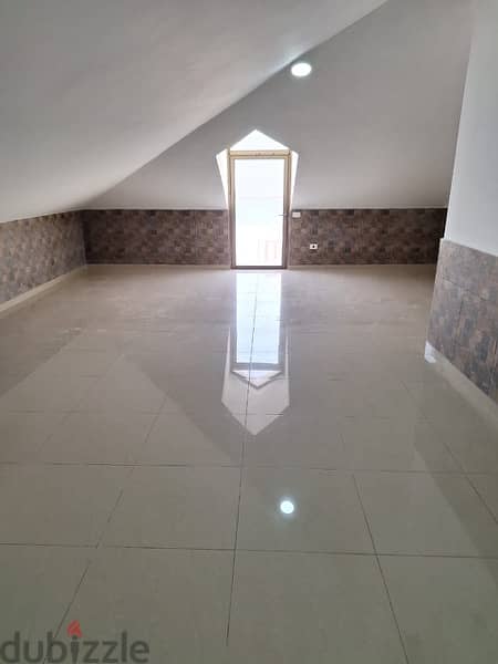 A rooftop apartment with open views for rent in Mazraat yachouh. 2