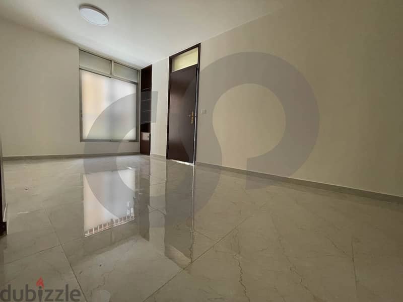Catchy apartment fully renovated in hamra/الحمرا  REF#IK104548 1
