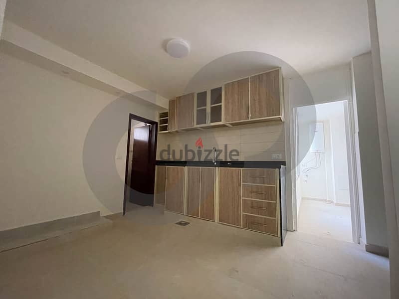 Catchy apartment fully renovated in hamra/الحمرا  REF#IK104548 3