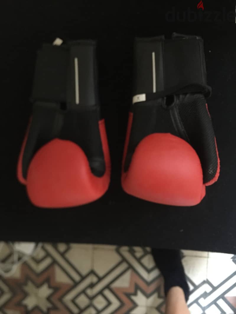 Boxing gloves - medium size - used once only 2