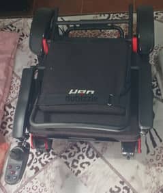 wheel chair with remote control and lithium batteris like new 0