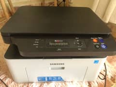 Samsung Xpress M2070 - multifunction printer 0