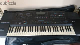 Roland E-96 keyboard with stand