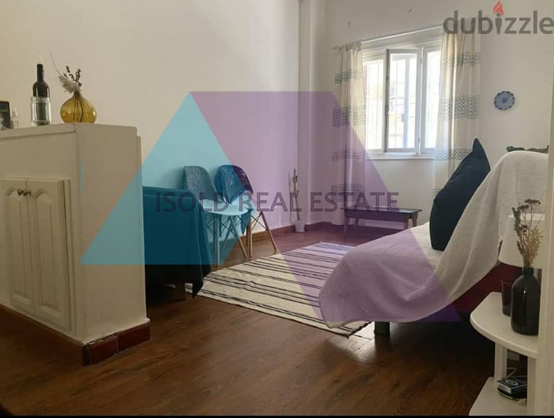 A furnished 70 m2 apartment with a terrace for rent in Gemayzeh 3