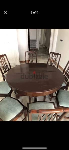 dining table adjustable and 8 chairs. 4