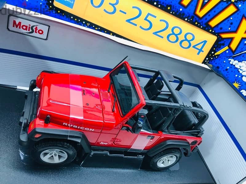 1/18 diecast Jeep Wrangler Rubicon RED. NEW & SEALED 2