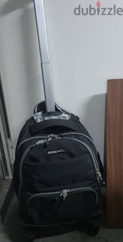 Export school bag with wheels like new