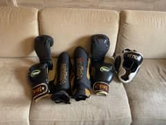 boxing gloves shin guards and head guard muay thai