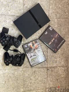 Play Station 2 plus controllers and games