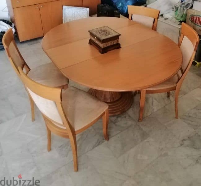 Dinning table and chairs 0