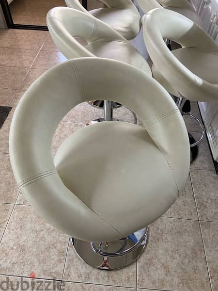 5 white leather chairs - used 1