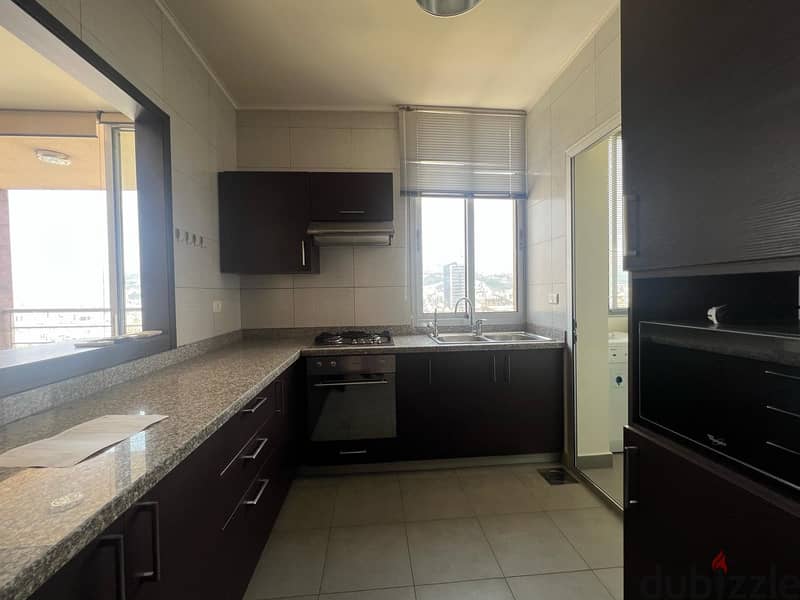 L15124 - A 3-Bedrooms Apartment with Open View For Rent In Achrafieh 2