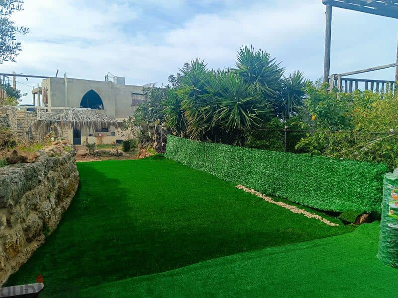 we diliver artificial grass green wall and fans 2