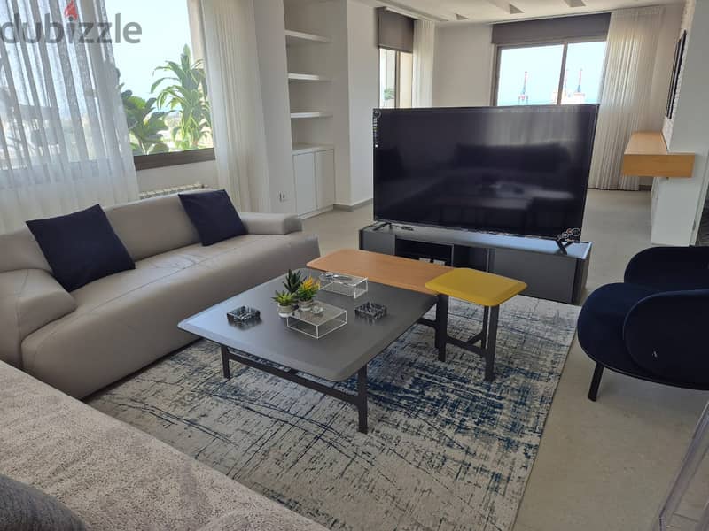 L15131-Furnished 1-Bed Apartment with Sea view For Rent In Mar Mikhael 1