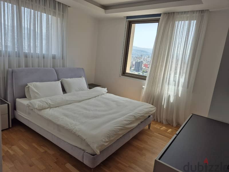 L15131-Furnished 1-Bed Apartment with Sea view For Rent In Mar Mikhael 4