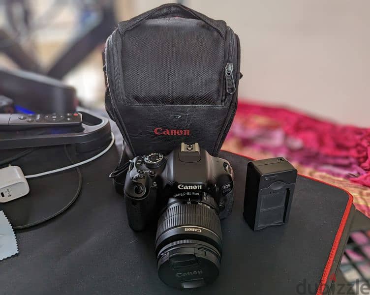 Canon 600D with kit lens 18-55mm and charge and bag 0