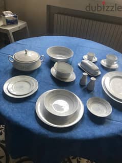 SET OF NEW PORCELAIN PLATES FOR 24 PERSONS