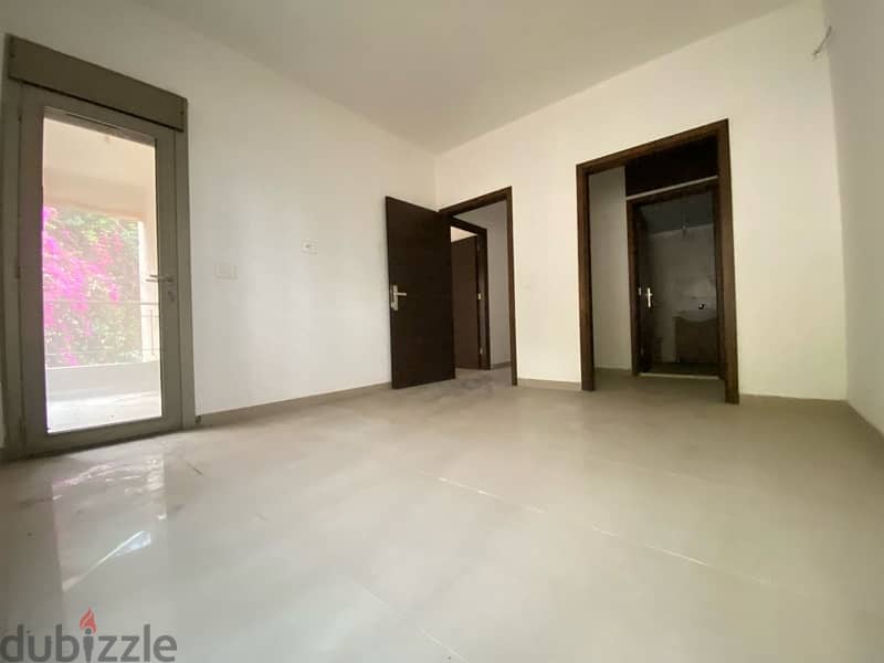 Spacious Apartment for sale in Naccache with open views. 12