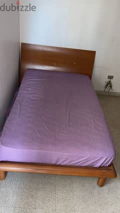 wooden double bed in good condition (sleep comfort)