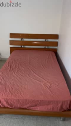 wooden double bed in good condition (sleep comfort) 0