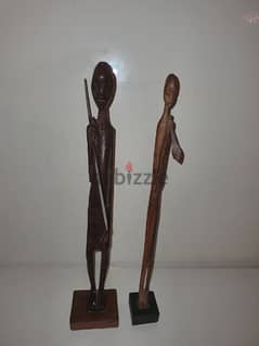 african statues couple