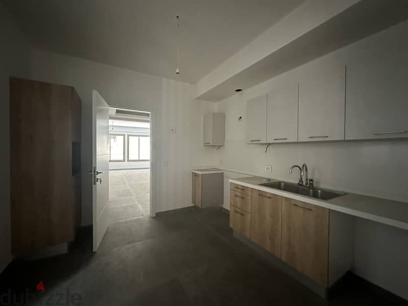 Achrafieh 155sqm | 2 Bedrooms | Prime Location | New Building 4