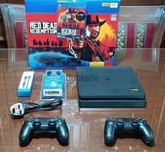 playstation 4 slim European with 2 controller all cables and one game 0
