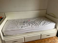 White bed without mattresse and a openable drawer 0