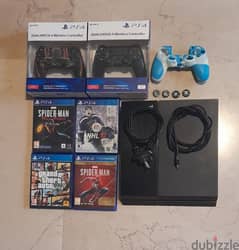 Ps4 PlayStation 4 with 4 cds 2 original controllers and accessories