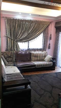 salon+ living room L shape+ grey curtain+ 2 wood tables